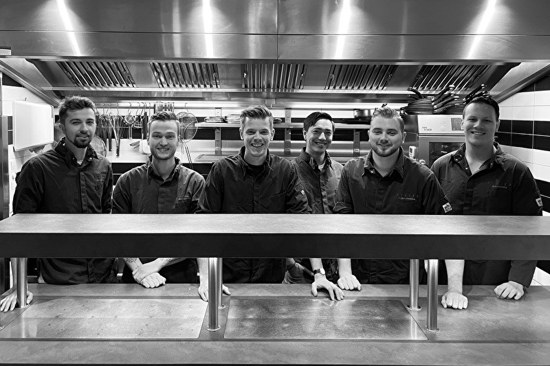 A kitchen team with ambition